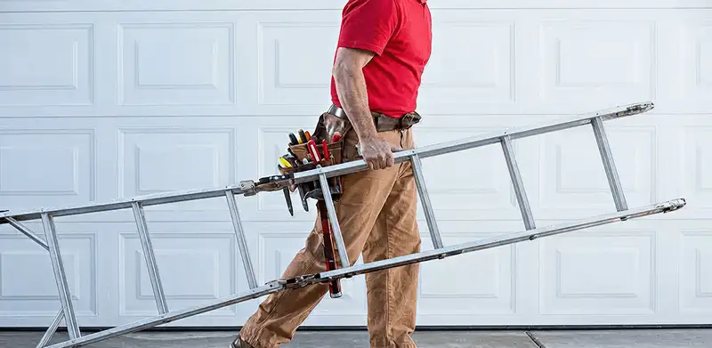 Garage door repair technician arriving with tools and ladder in Myrtle Beach, SC