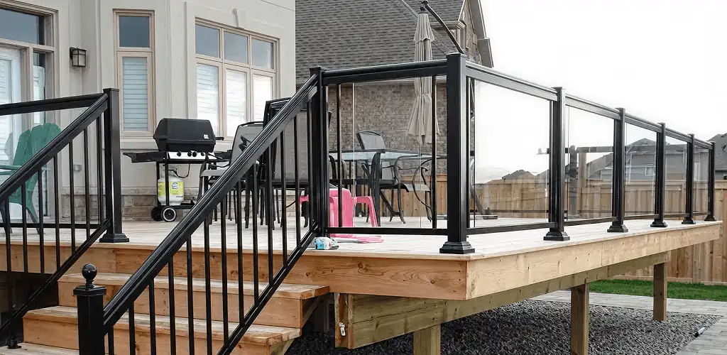 Handrail installation on a deck staircase for safety and code compliance in Myrtle Beach, SC